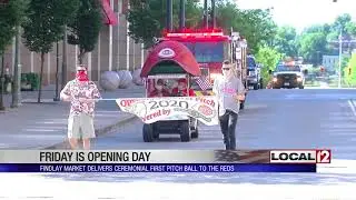 Ceremonial first pitch ball escorted through Findlay Market parade route for Opening Day