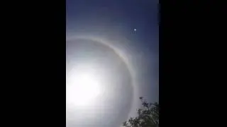 Halo effect around sun caused by ice crystals