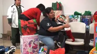 Centinela prison officials give gifts to adopted families