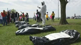 Protest held outside US prison plagued with coronavirus cases | AFP