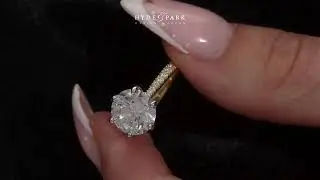 Round Brilliant Cut Engagement Ring With Tulip setting