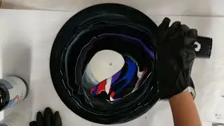 Acrylic pour on a vinyl record with Artist's loft ready-mixed pouring paint