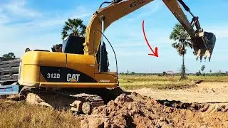 Excavator and Dump Truck Working Together | Heavy Equipment in Action
