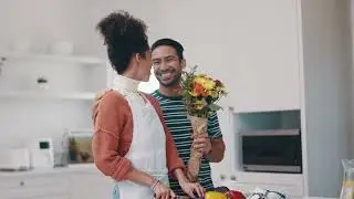 Heartwarming Surprise: Free Stock Video of a Couple, Home, and Flower Bouquet