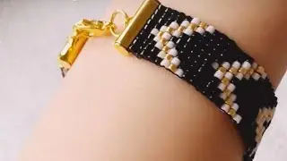 Beautiful high quality Miyuki Delica Japanese beads bracelet in black, gold and white shades.