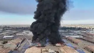 Drone View Shows Thick Black Smoke Rise During Warehouse Fire in Bakersfield
