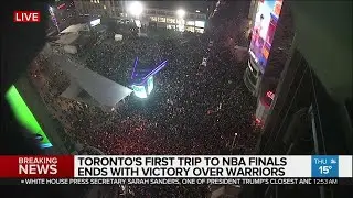 Thousands of people celebrate at Yonge-Dundas Square