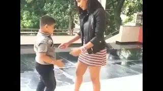 Priya Anand tries to lift a chubby kid