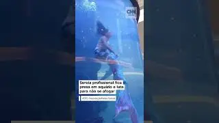 #Shorts- Sereia profissional fica presa em aqu&aacute;rio e luta para n&atilde;o se afogar