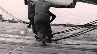 US F7U-3 Cutlass on deck of USS Hancock CV-19 in Pacific Ocean. HD Stock Footage