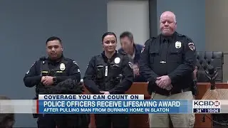 Slaton police officers receive lifesaving award, after rescuing man from burning home