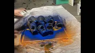 Spray paint painting with melting cups