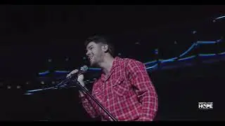 Nick Jonas singing &ldquo;Jealous&rdquo; during the Jonas Brothers Match For Hope Halftime Show in Doha, Qatar