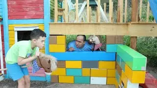 LUCAS E PAPAI BRINCAM DE CONSTRUIR UM FORTE