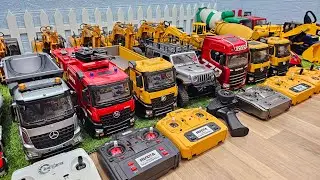 Rc truck konstruksi, rc dump truck huina 1536, rc jeep MN 128, truk molen, excavator, trailer