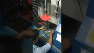 Helical compression spring test
