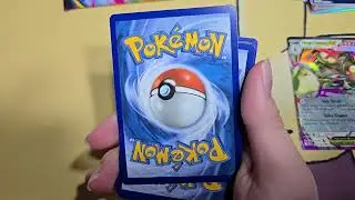 opening Pokémon packs and a Yu-Gi-Oh! boosters
