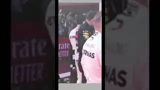 Max Verstappen fake tying shoe lace to observe the Mercedes car