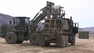 U.S. Marines with Marine Wing Support Squadron 271 construct a helicopter landing zone