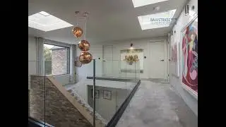 Anthracite frameless glass balustrade for landing