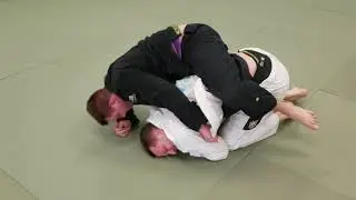 BJJ black belt vs. BJJ purple belt.