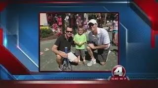Patrick Nolan hands out awards to young hosital patients at Kids Cup Tennis Challenge
