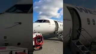 Boarding WestJet Flight To Kelowna