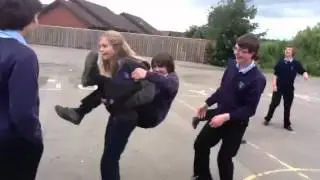 Girl giving guy a piggy back challenge