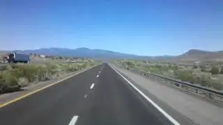 Highspeed past Picacho Butte on Interstate 40 West in Northern Arizona
