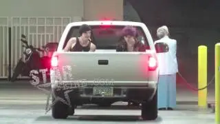 Paris Jackson and boyfriend Michael Snoddy illegally hitch a ride in the back of a pick up truck