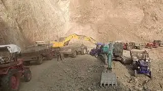 Blasting work in mine's stone work Tractor loading process stone work blasting work 
