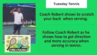 63 Coach Robert shows the throwing motion to improve your tennis serve.