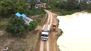 Equipment machine Bulldozer and Heavy dump truck 25T working Land Filling up Big pit