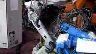 Motoman HP6 industrial robot with NX100 controller
