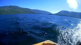Sailing and moving fast! You can see the daggerboard on the underwater shot