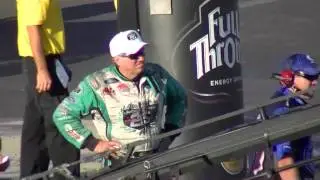 John Force watching daughter Ashley race