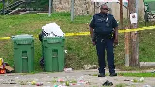 Police search for suspects in Baltimore mass shooting