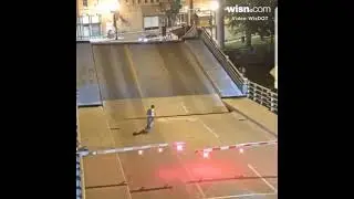 Riding bike on rising bridge gone wrong