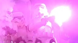 Missed shot from an E 11 blaster incapacitates a nearby soldier