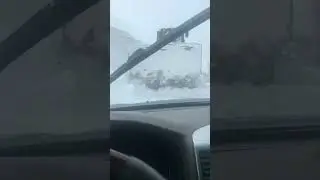 Doser cleaning snow on the mountain Karabura pass