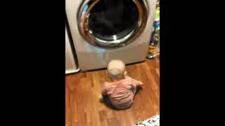 Jake watches the dryer