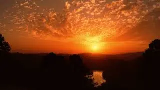 🌅🧡 Golden Hour Unveiled: 4K Time-Lapse of a Captivating Orange Sunset 📷🌄