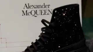 Alexander McQueen Crystal-Embellished Tread Slick Boots on feet