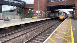 LNER Azuma Hitachi AT300 passing through Stevenage Railway Station at high speed