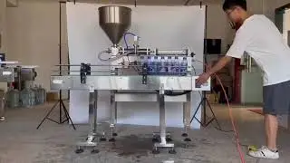 Semi auto piston filling machine integrated with conveyor