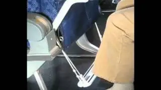 Happy Feet  Airplane Footrest. A portable travel footrest for economy class airline passengers.