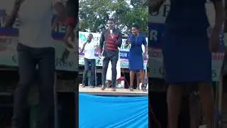 Kolango Henry ft Brendah leading praises in a crusade in Ahero