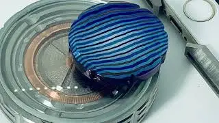 Timascus MokuTi Spinning Worry Coin with Ruby bearing for longer spin times and cool WARP effects!