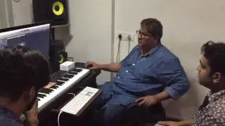 Music Director Monty Sharma Composing Music.