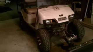golf cart with snow plow